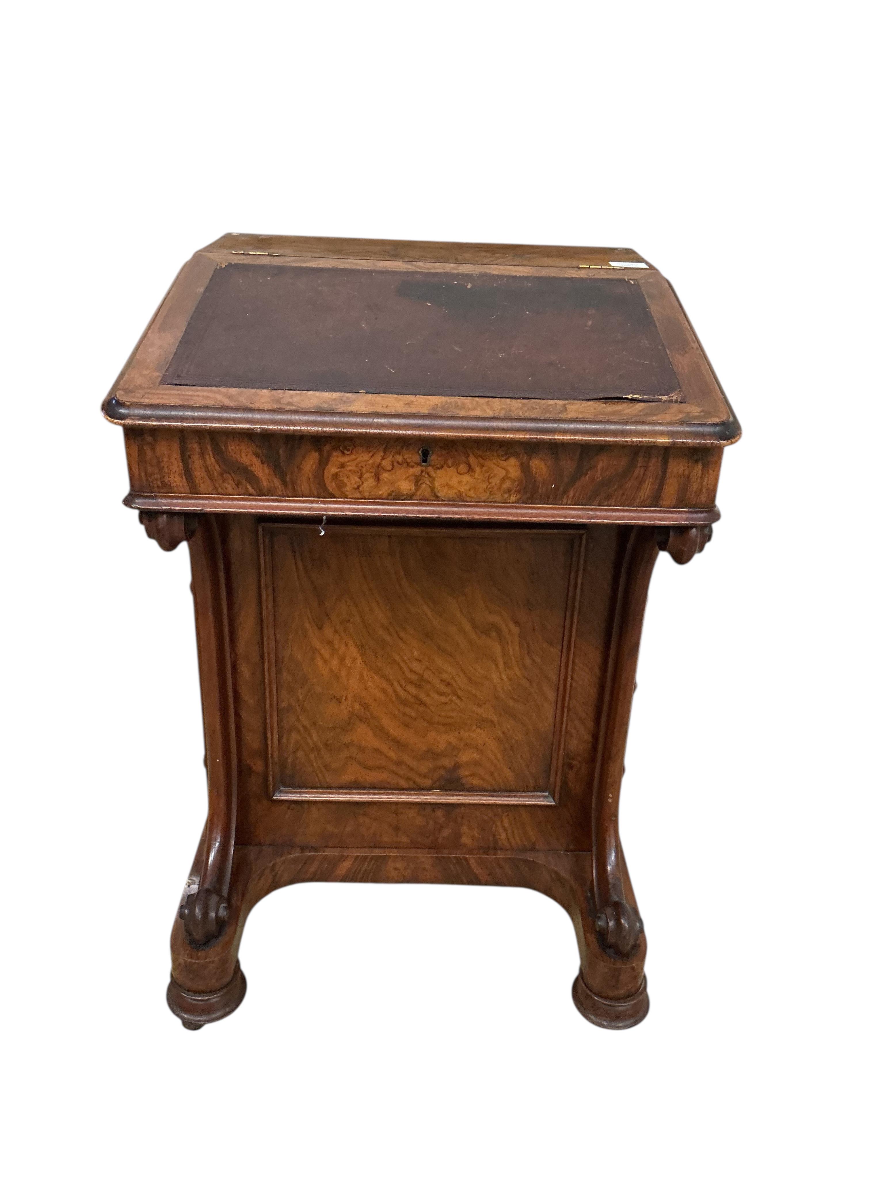 A Victorian figured walnut Davenport, lacks superstructure, width 53cm, depth 53cm, height 81cm